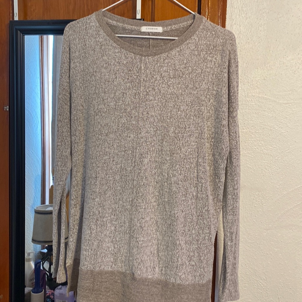 Size small sweater, cherish brand, 10 in color super cute, soft and stretchy!